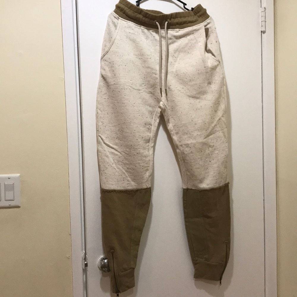 Never used tan pants with zippers